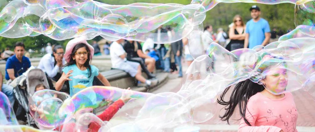 Children playing with bubbles