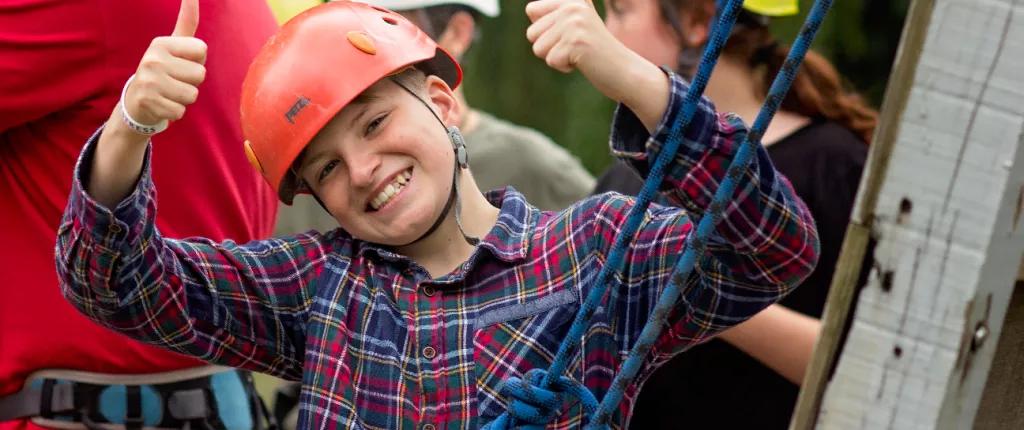 A boy abseiling