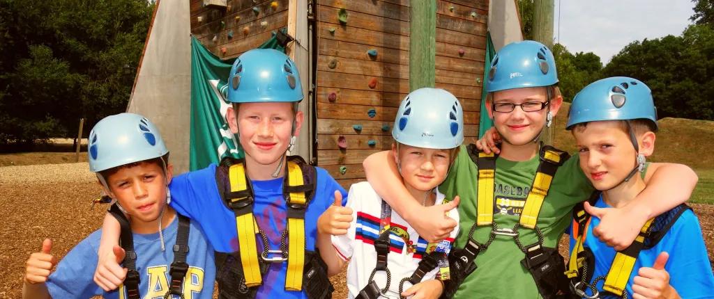 Boys in climbing gear