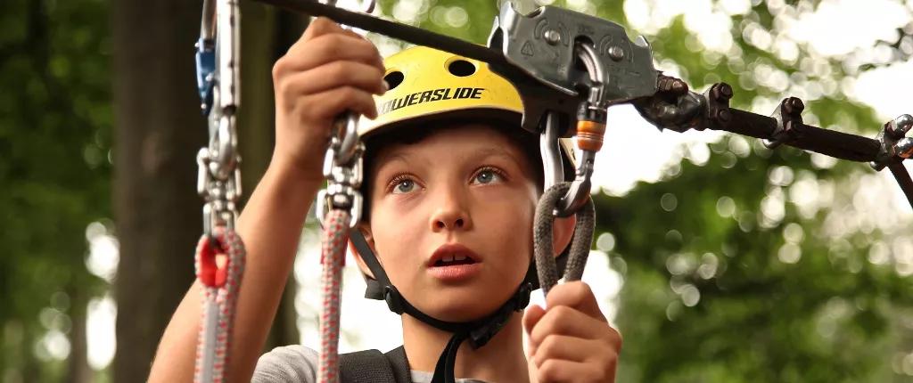 Boy on climbing ropes