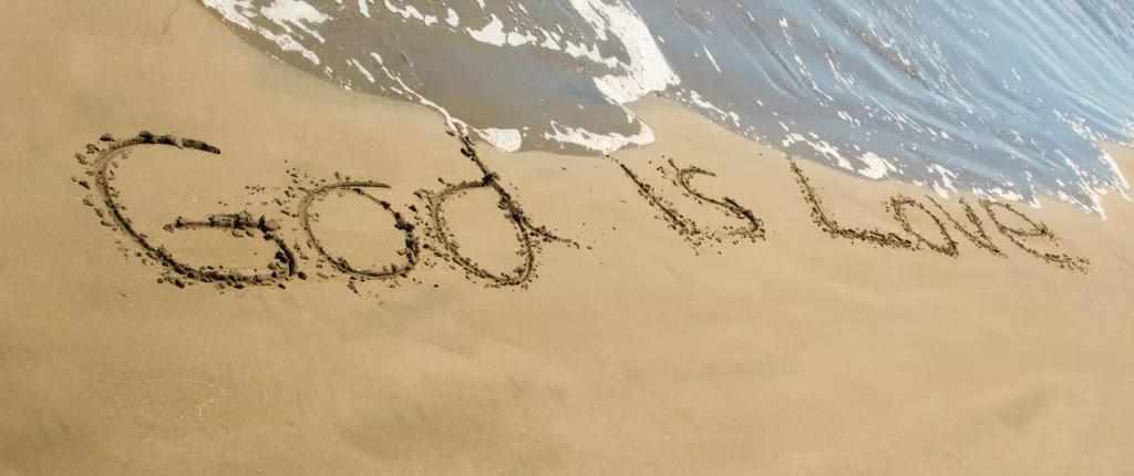 God is Love in the Sand