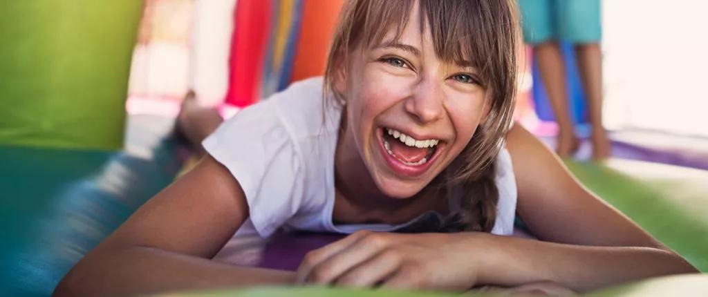 Girl on bouncy castle