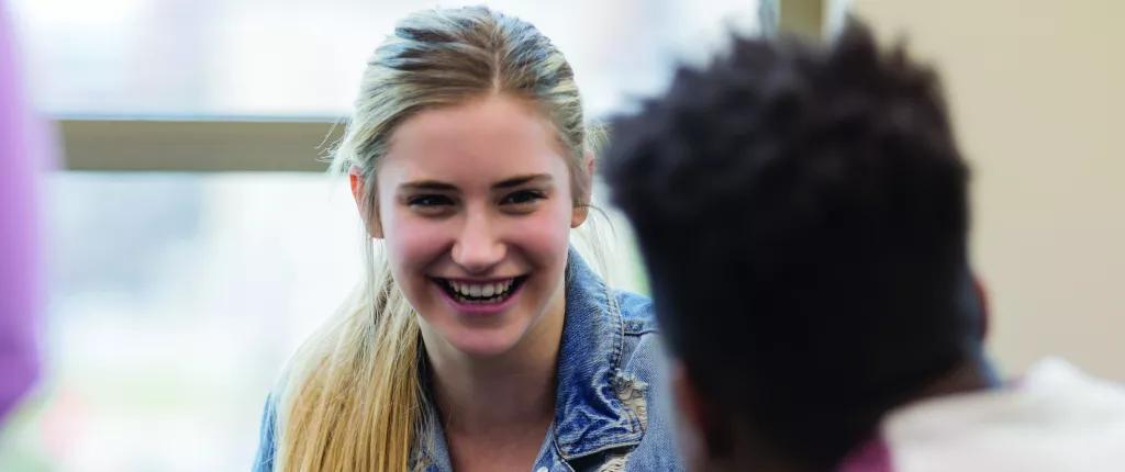 Two young people chatting