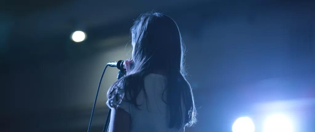 Girl on mic