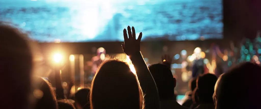 Young people worshipping