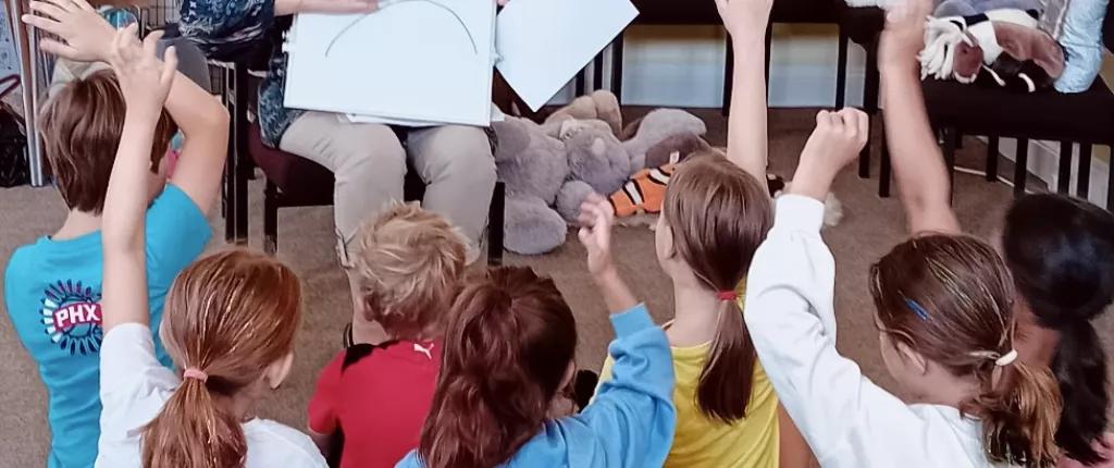 Group of children listening to a story