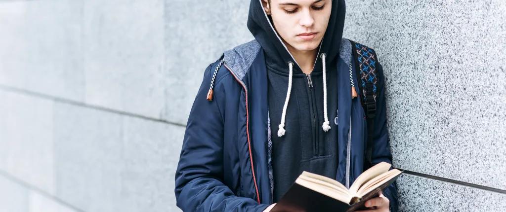 Young person reading the Bible
