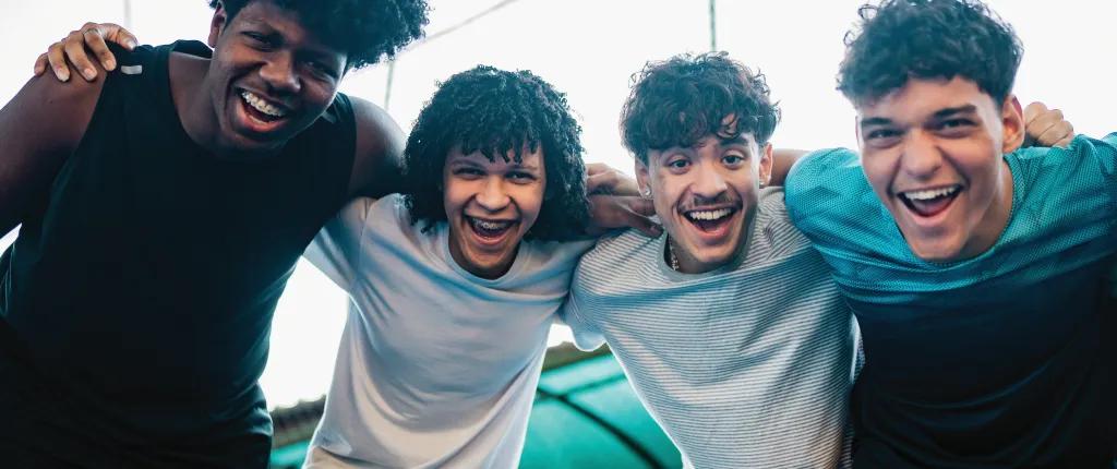 Boys in t-shirts smiling