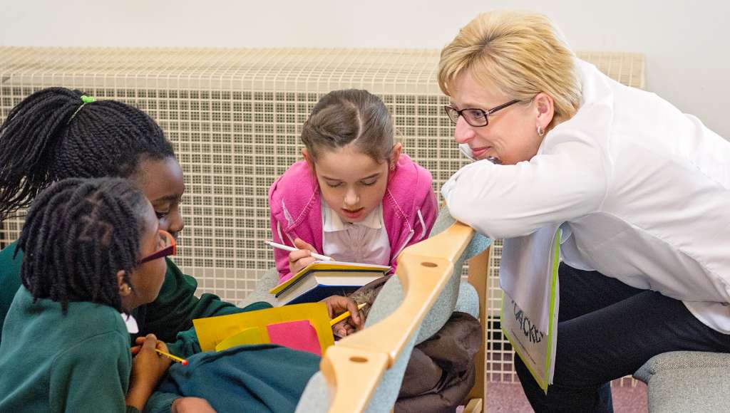 Leader with school children