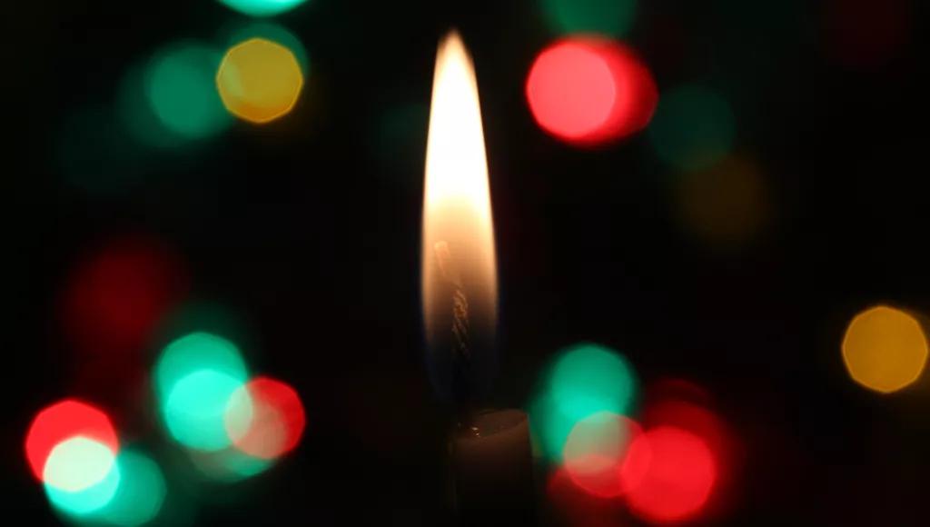 Candle and coloured lights