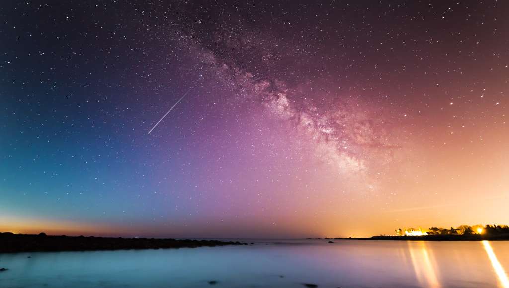 Shooting star over bay