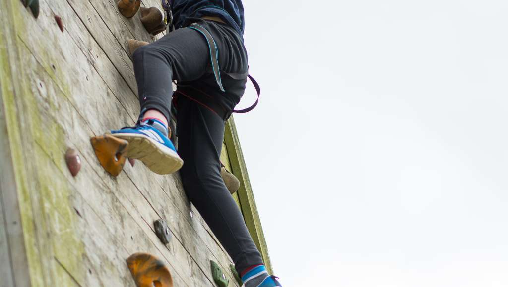 Edale Challenge holiday child on climbing wall