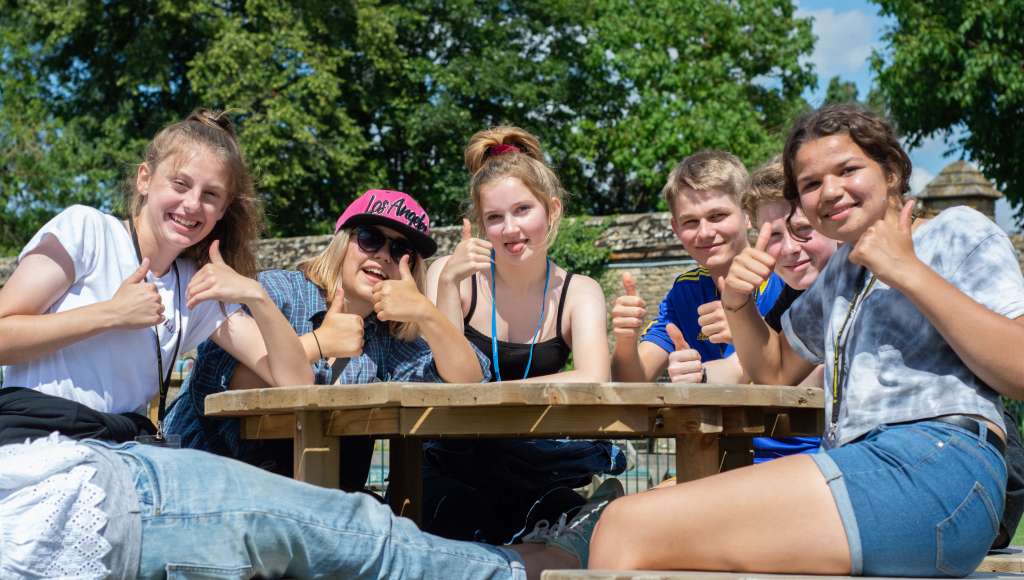 The Maze holiday girls with thumbs up