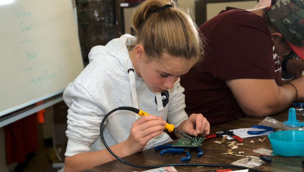 Girl doing electronics