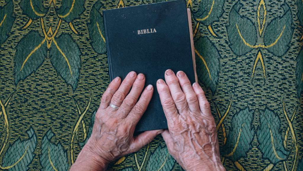 Old hands Bible