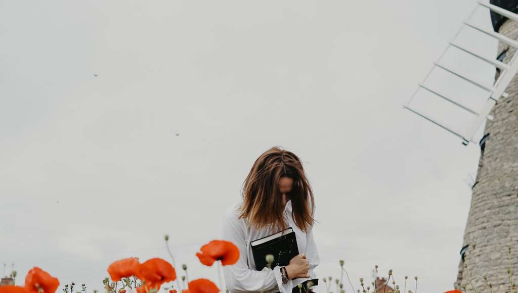 Woman windmill poppies