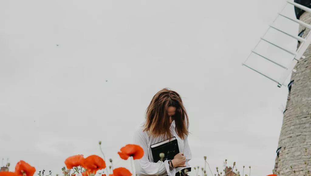 Woman windmill poppies