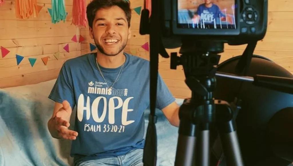 Team member filming video content for mission