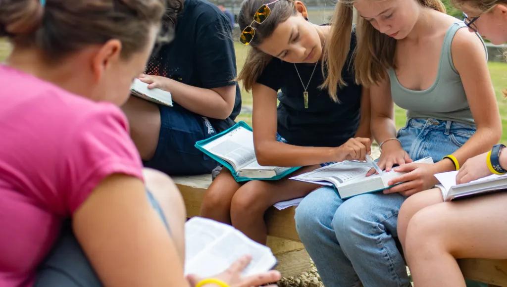 Group of girls studying their bibles