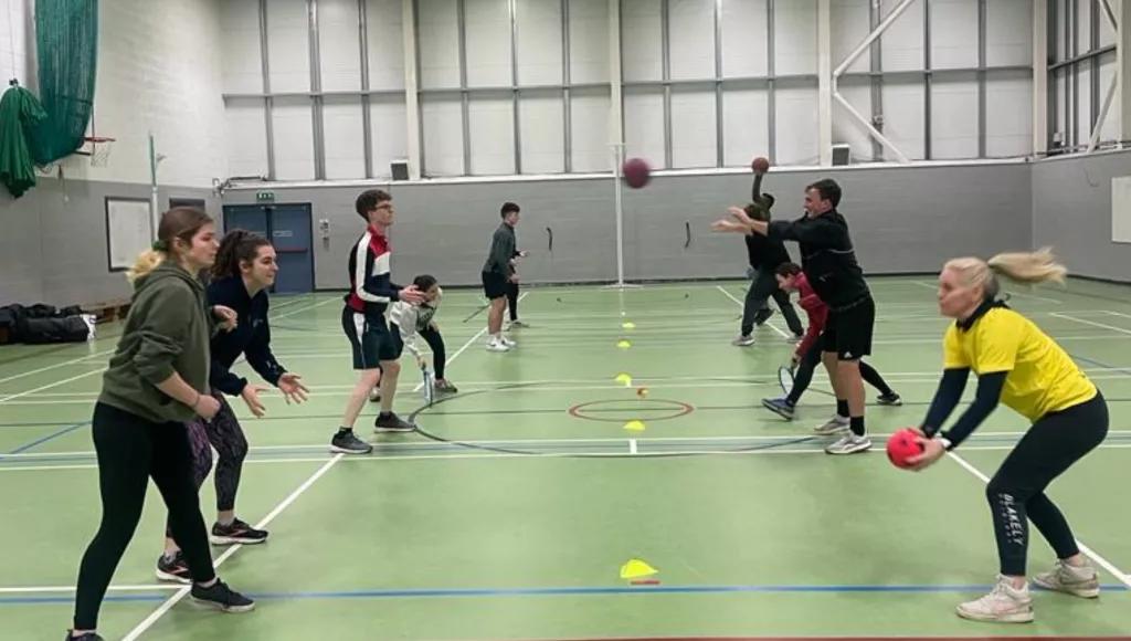 playing sports in sports hall