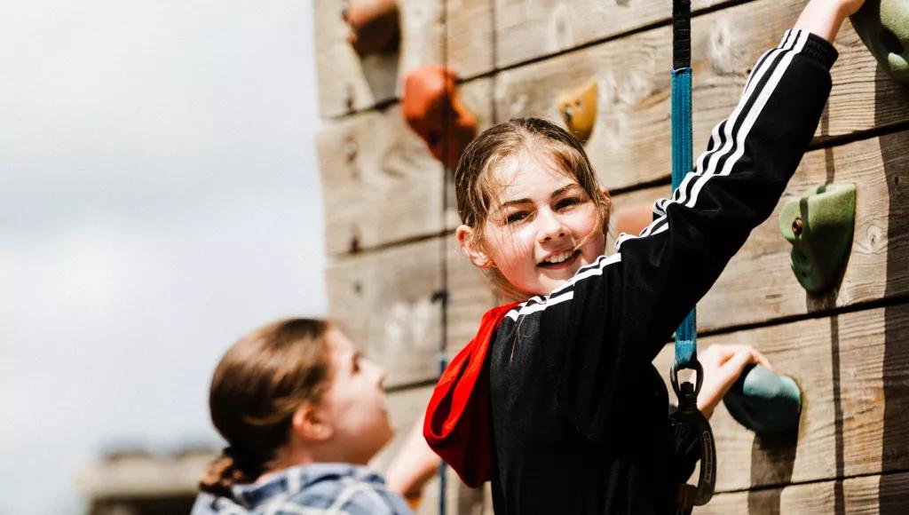 Girl on climbing wall 