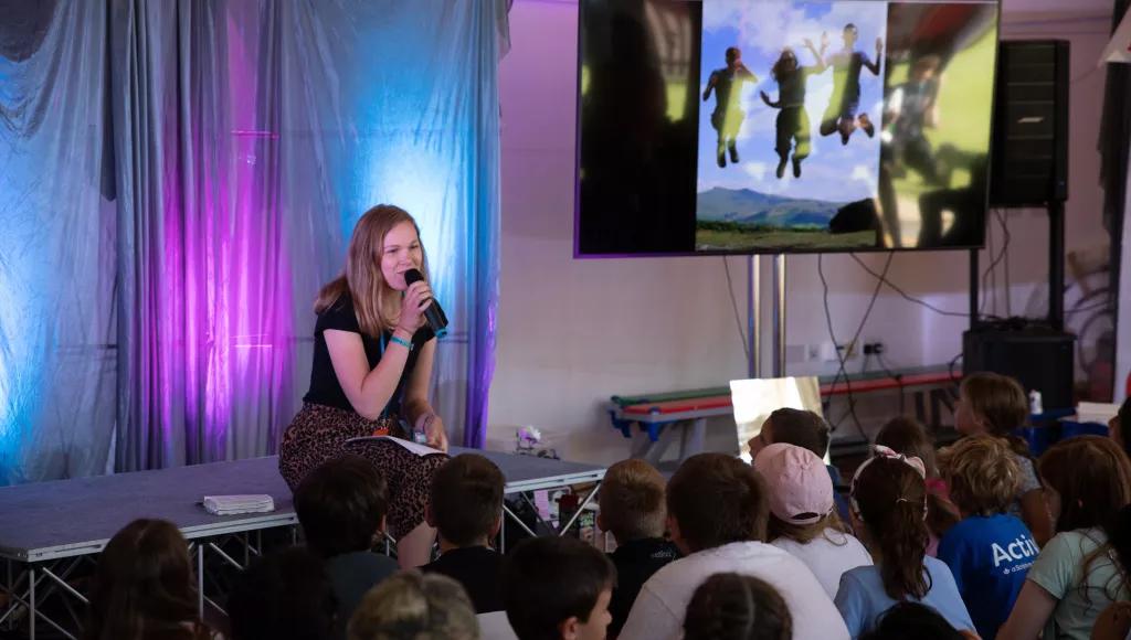 Young leader on stage