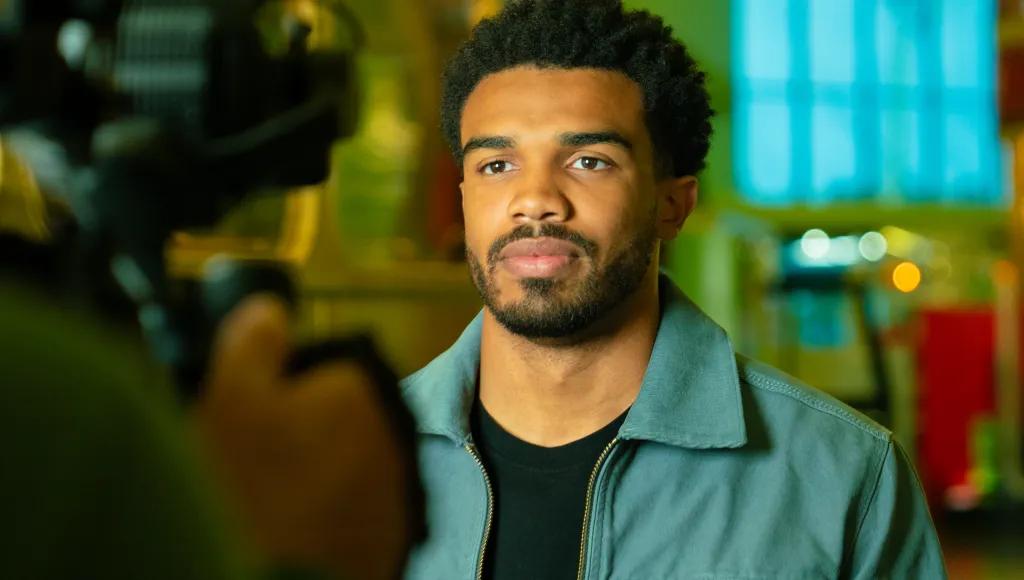 Josh being filmed with camera in foreground 