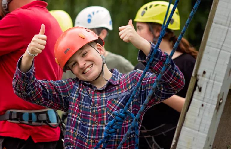 A boy abseiling