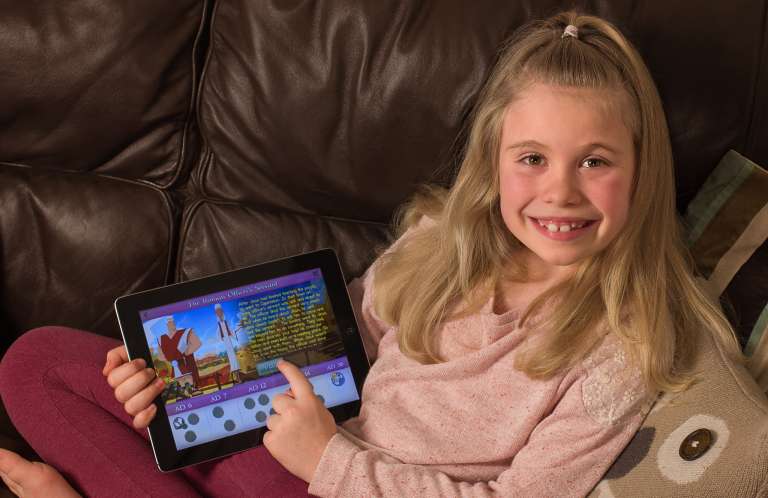 Girl playing Guardians of Ancora