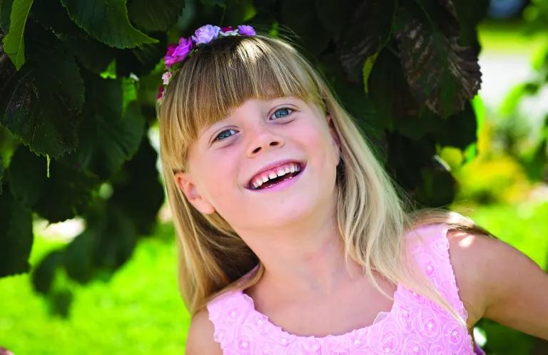Girl in Pink Dress - Smiling