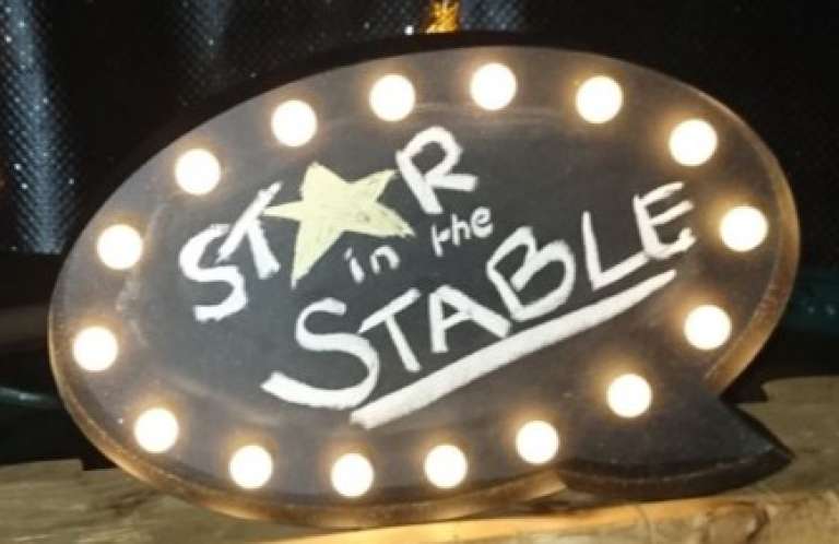 Star in the stable sign Star in the stable sign