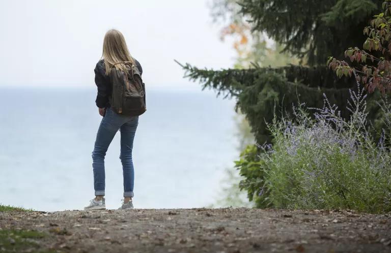 A girl looking out to sea