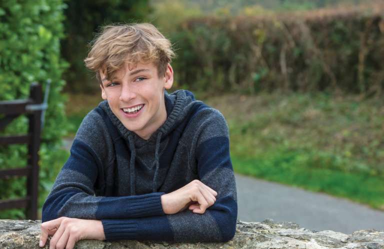 Teenage boy smiling
