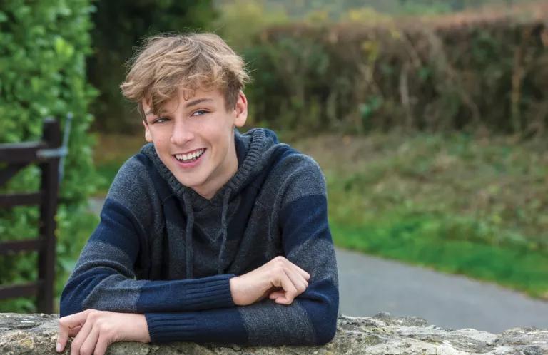 Teenage boy smiling