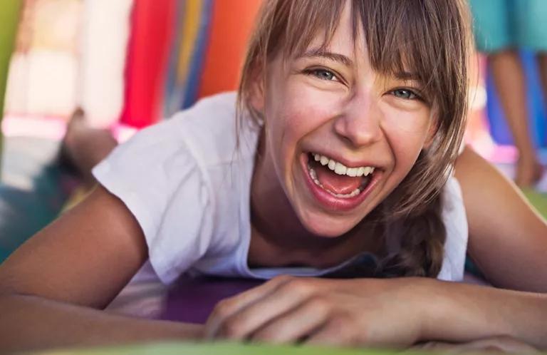 Girl on bouncy castle
