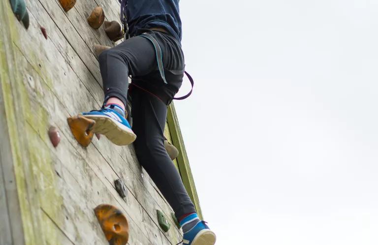 Edale Challenge holiday child on climbing wall
