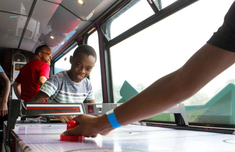 Playing air hockey