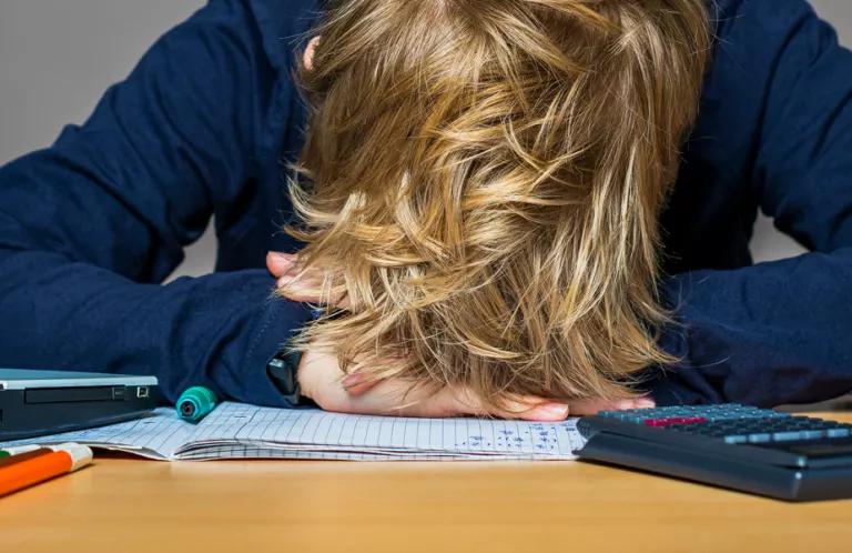 child at desk
