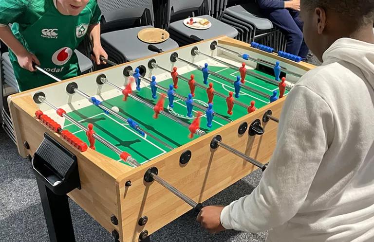 Children playing table football
