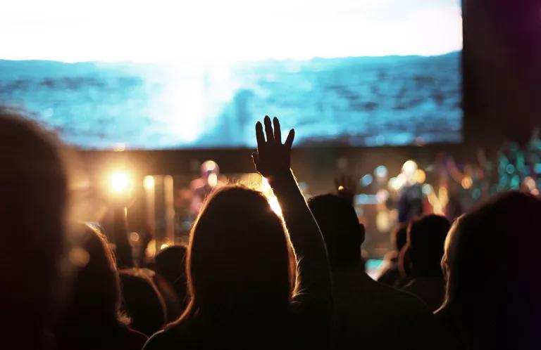 Young people worshipping