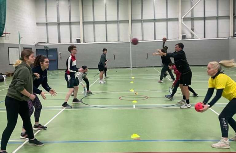 playing sports in sports hall
