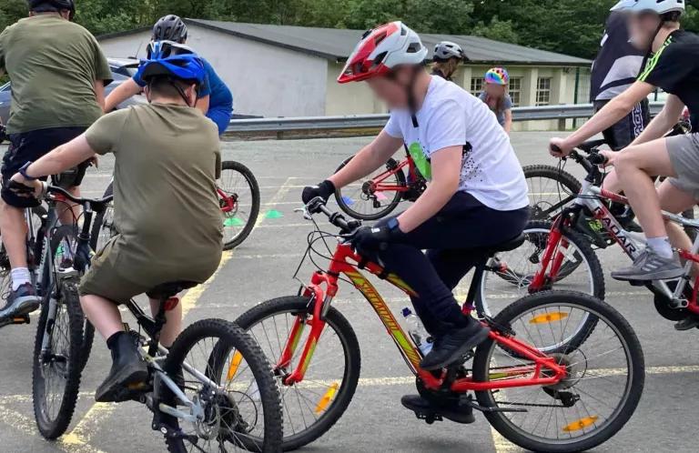 Young people on bikes
