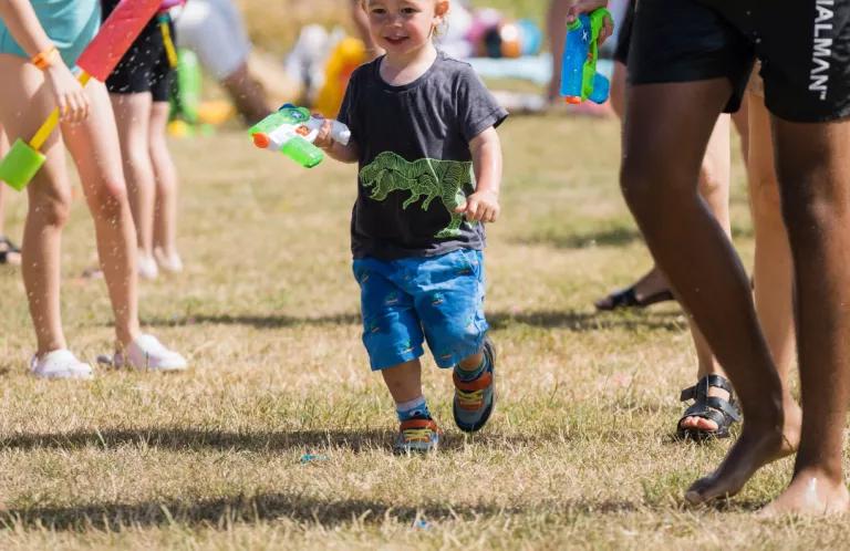 child with water gun