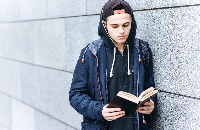 Young person reading the Bible