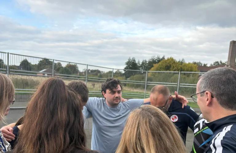 Jordan in a huddle 