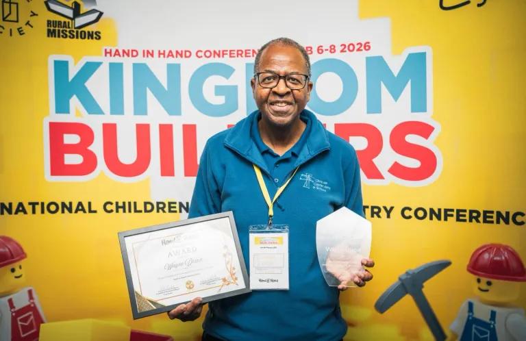 Wayne Dixon with long service award