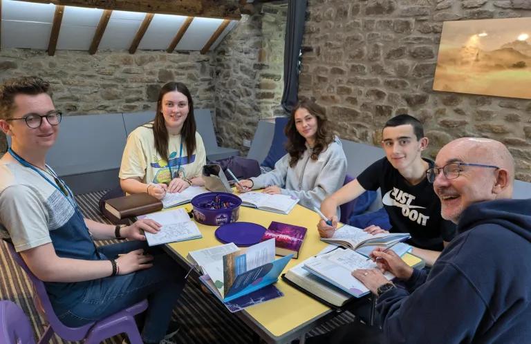 Young leaders and staff doing a Bible study