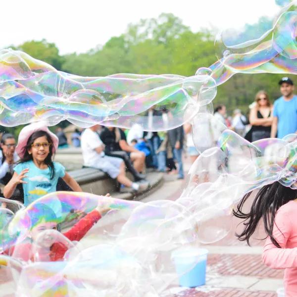 Children playing with bubbles