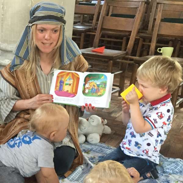 Tori Redding reading to children