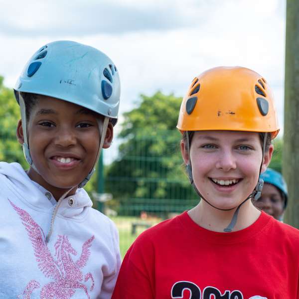 Mind After Christ holiday children with helmets ready for rock climbing